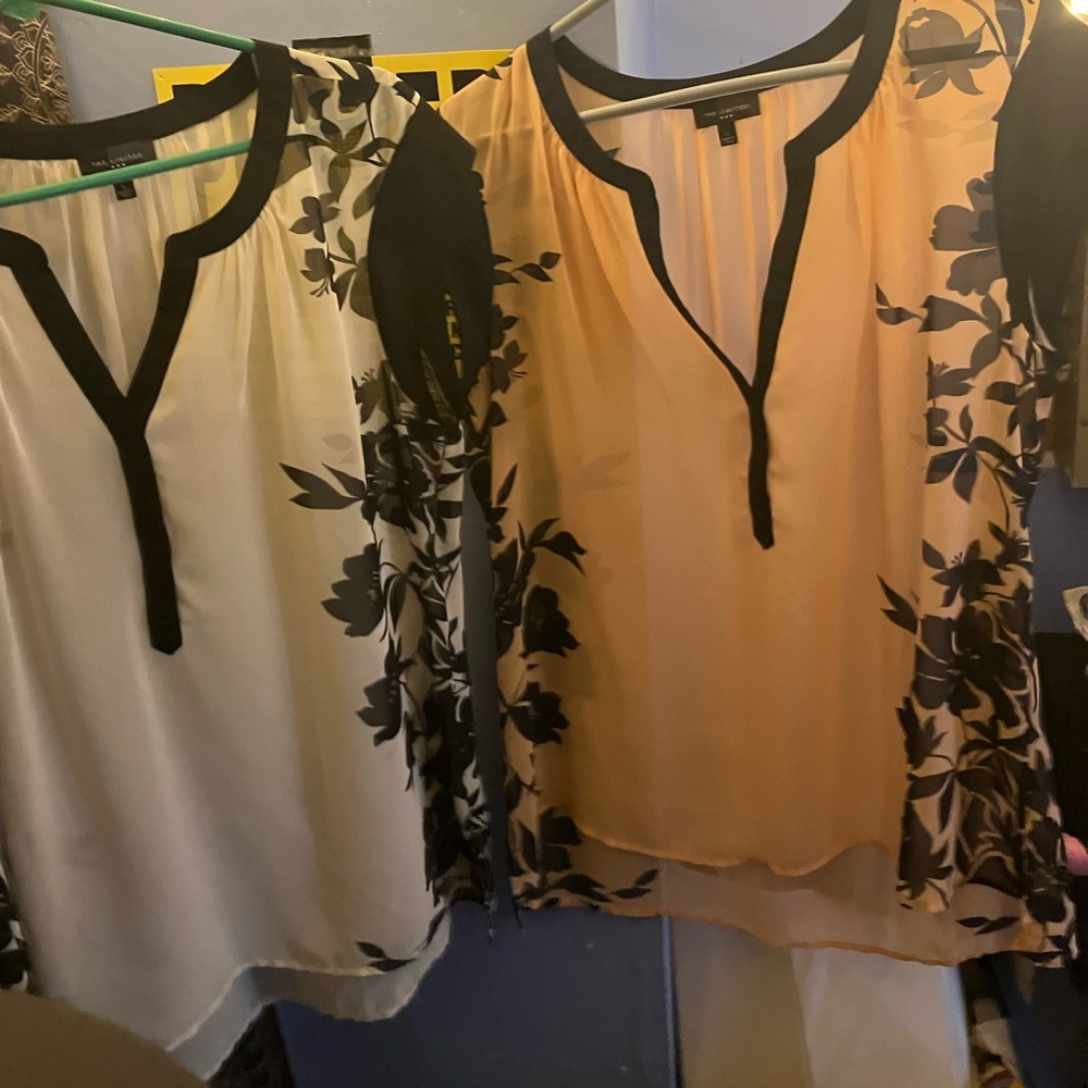 Two dress shirts come together
